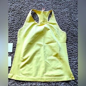 Zyia tank, size XL light yellow colored